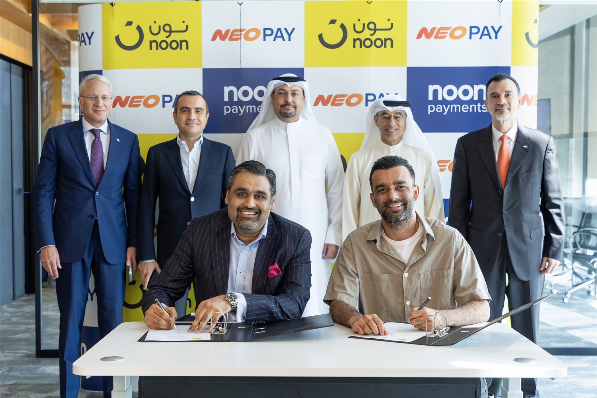 NEOPAY and noon representatives at the agreement signing